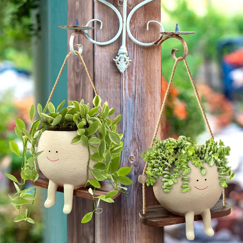 أصيص نباتات عصارية بتصميم رأس  - مراجعة Garden Swing Chair وسعره